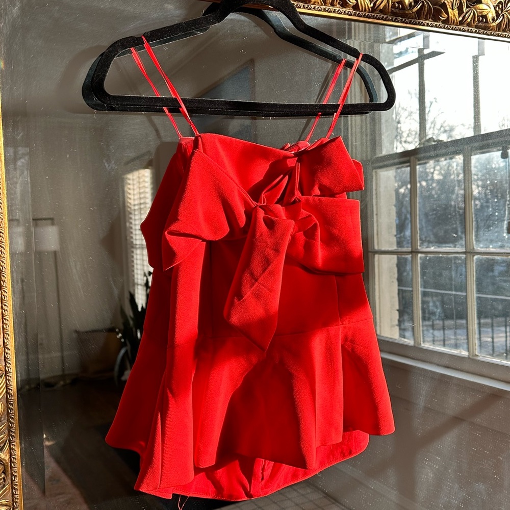 Anthropologie- Adelyn Rae, small red strapless top with bow.